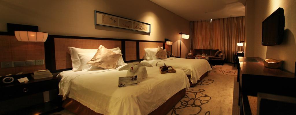 Jinan Scholars Hotel Room photo