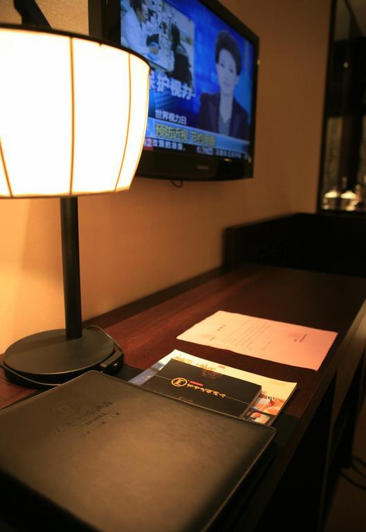 Jinan Scholars Hotel Room photo